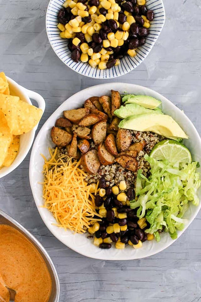 THESE CHICKEN SAUSAGE & QUINOA BURRITO BOWLS ARE EASY, MAKE AHEAD FRIENDLY, AND SO QUICK TO MAKE YOU’LL HAVE DINNER ON THE TABLE IN JUST 15 MINUTES