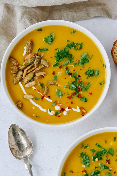 Instant Pot Butternut Squash Soup is delicious and easy, ready in under 30 minutes so and it makes weeknight meal planning a cinch.  The soup can also be made gluten free and vegan with the switch of a few ingredients.
